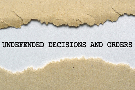 Text of defended decisions and orders written on ripped paper - used on licensed from ingram image