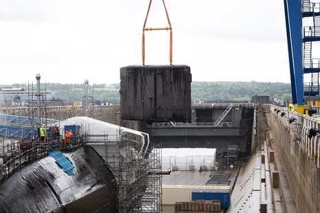 Decomissioned Submarine Swiftsure has its fin cut and removed