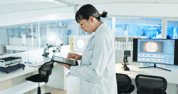 Science, research and woman in lab with tablet, virus engineering or medical innovation. Search, reading and Asian scientist on digital app for bacteria growth, vaccine development or study results; Shutterstock ID 2556693661; purchase_order: Bynder library; job: ; client: ; other: