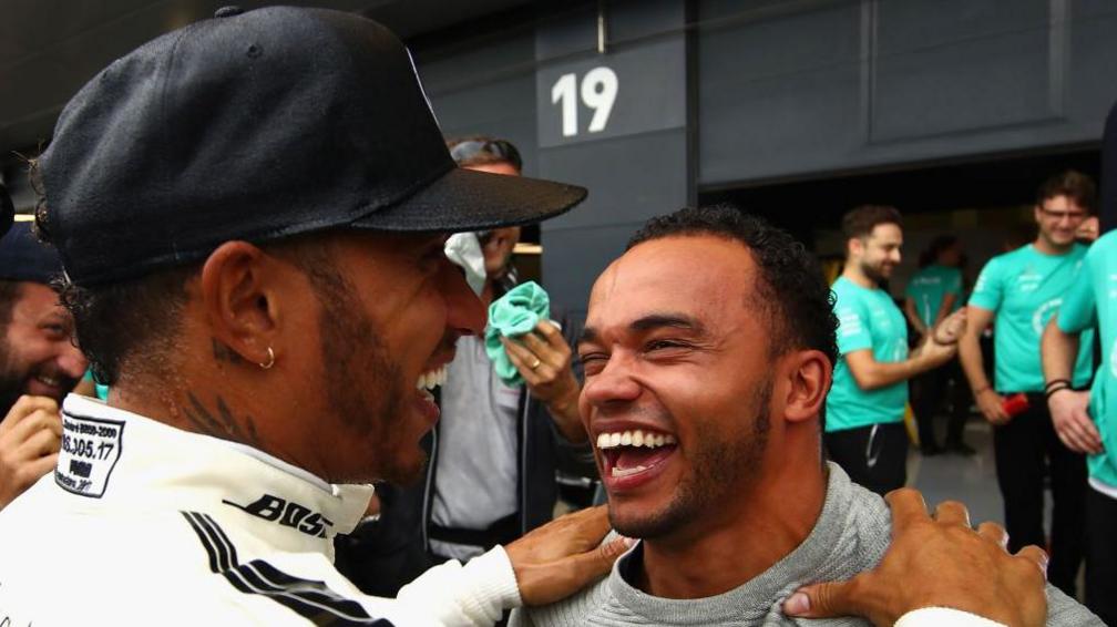 Lewis Hamilton hugging his brother Nic Hamilton