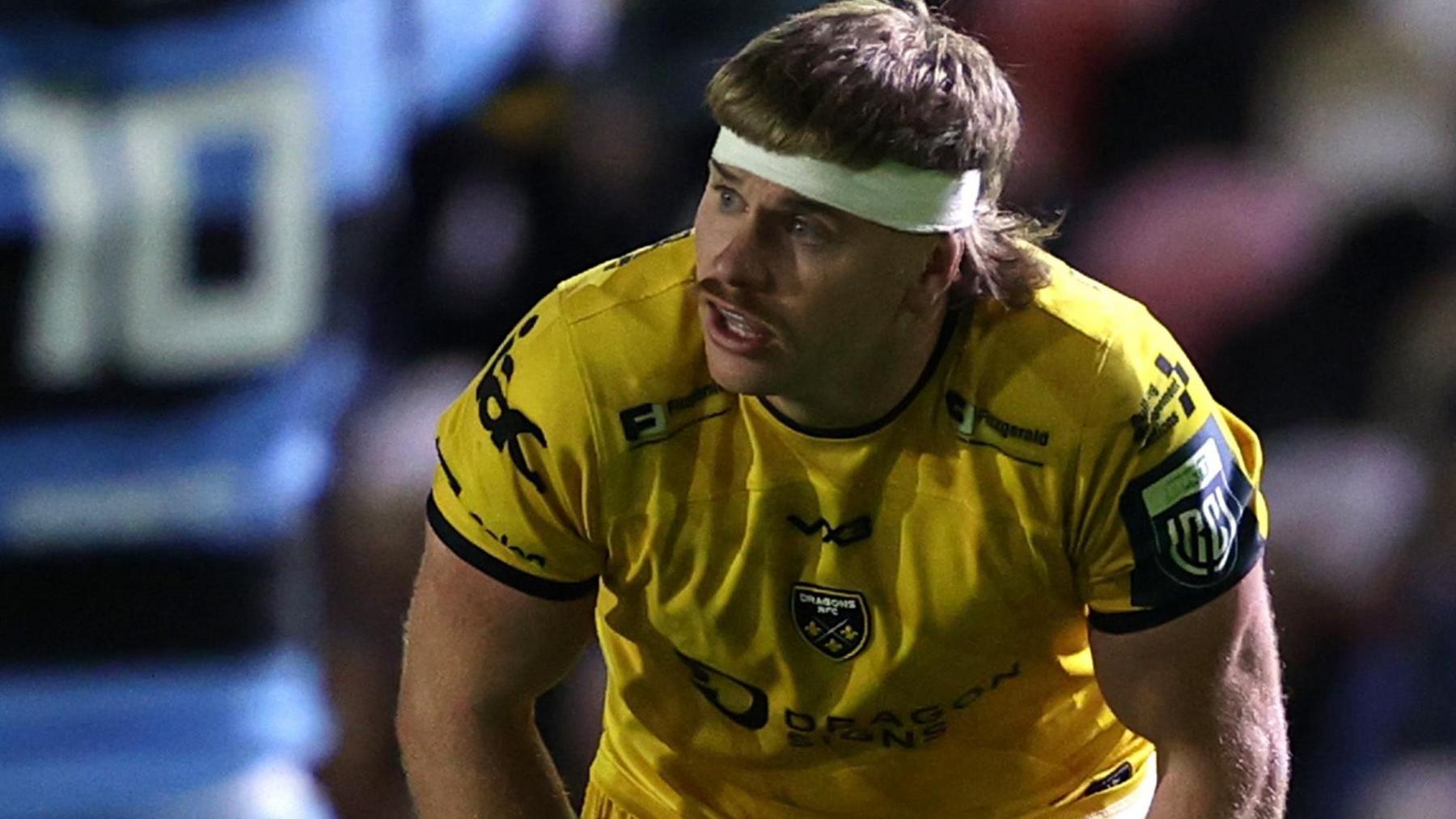 Aaron Wainwright looks on in Dragons' derby defeat to Cardiff