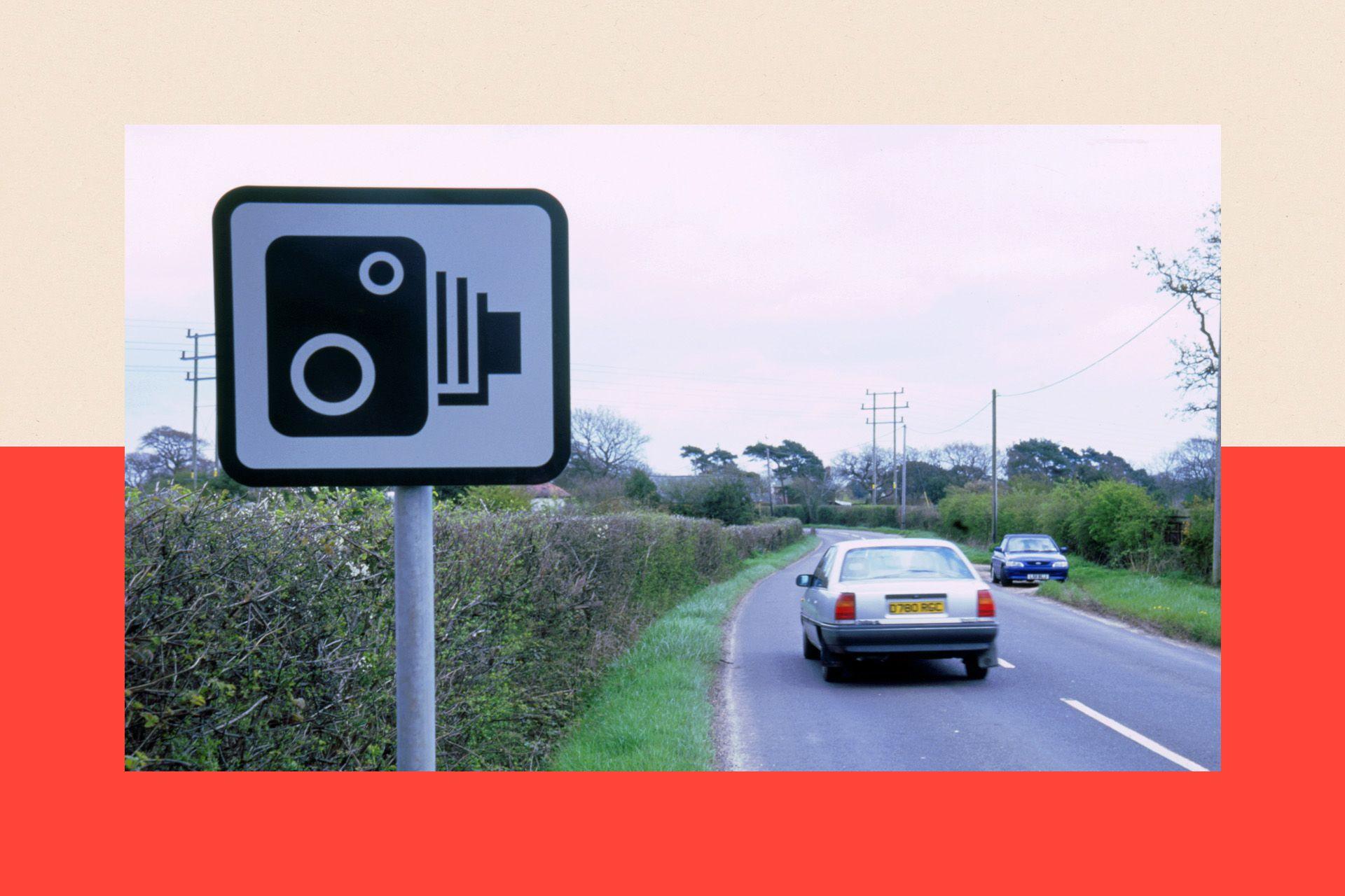 Speed camera sign by a road