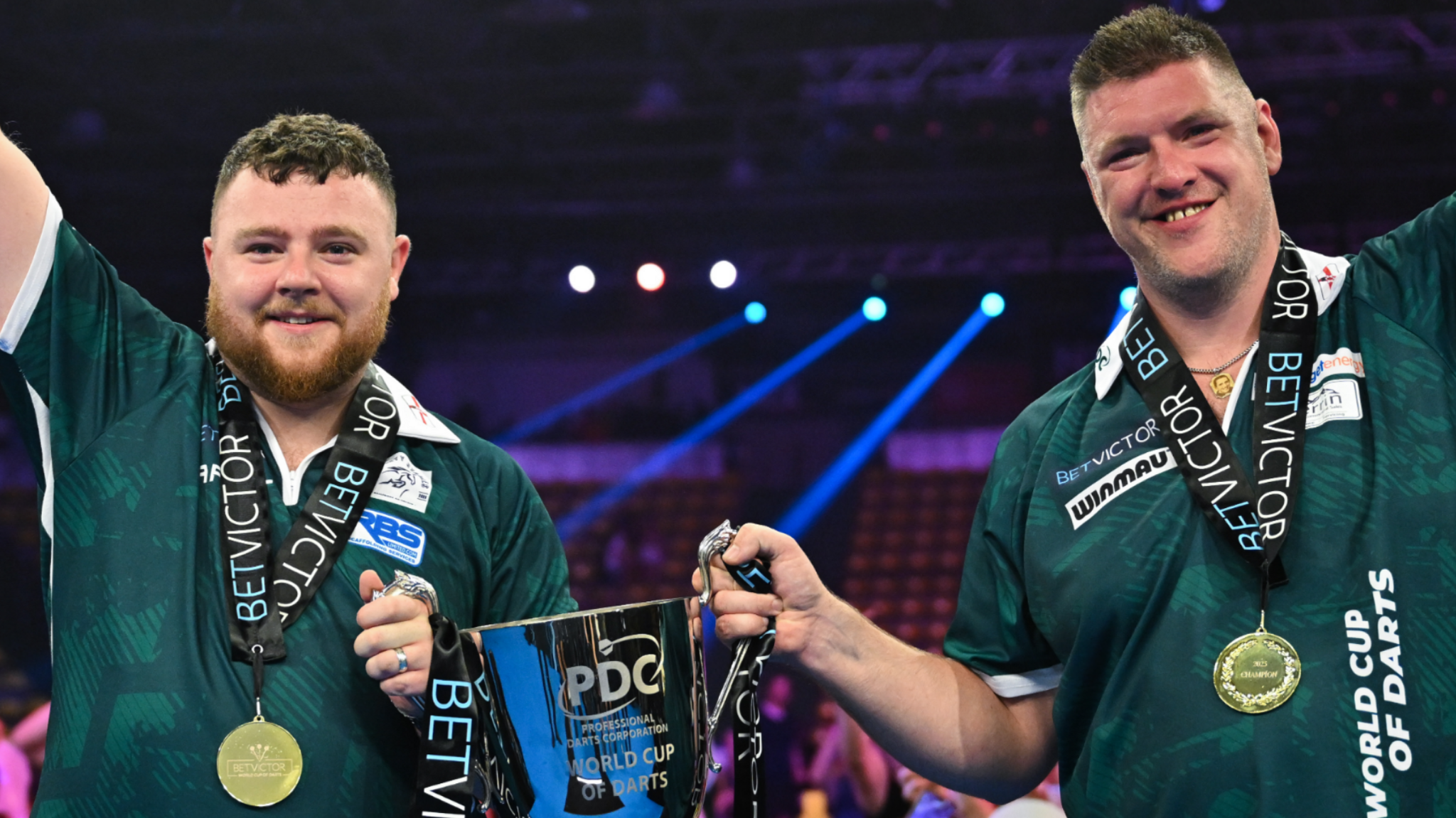 Josh Rock and Daryl Gurney celebrate winning the Grand Slam of Darts