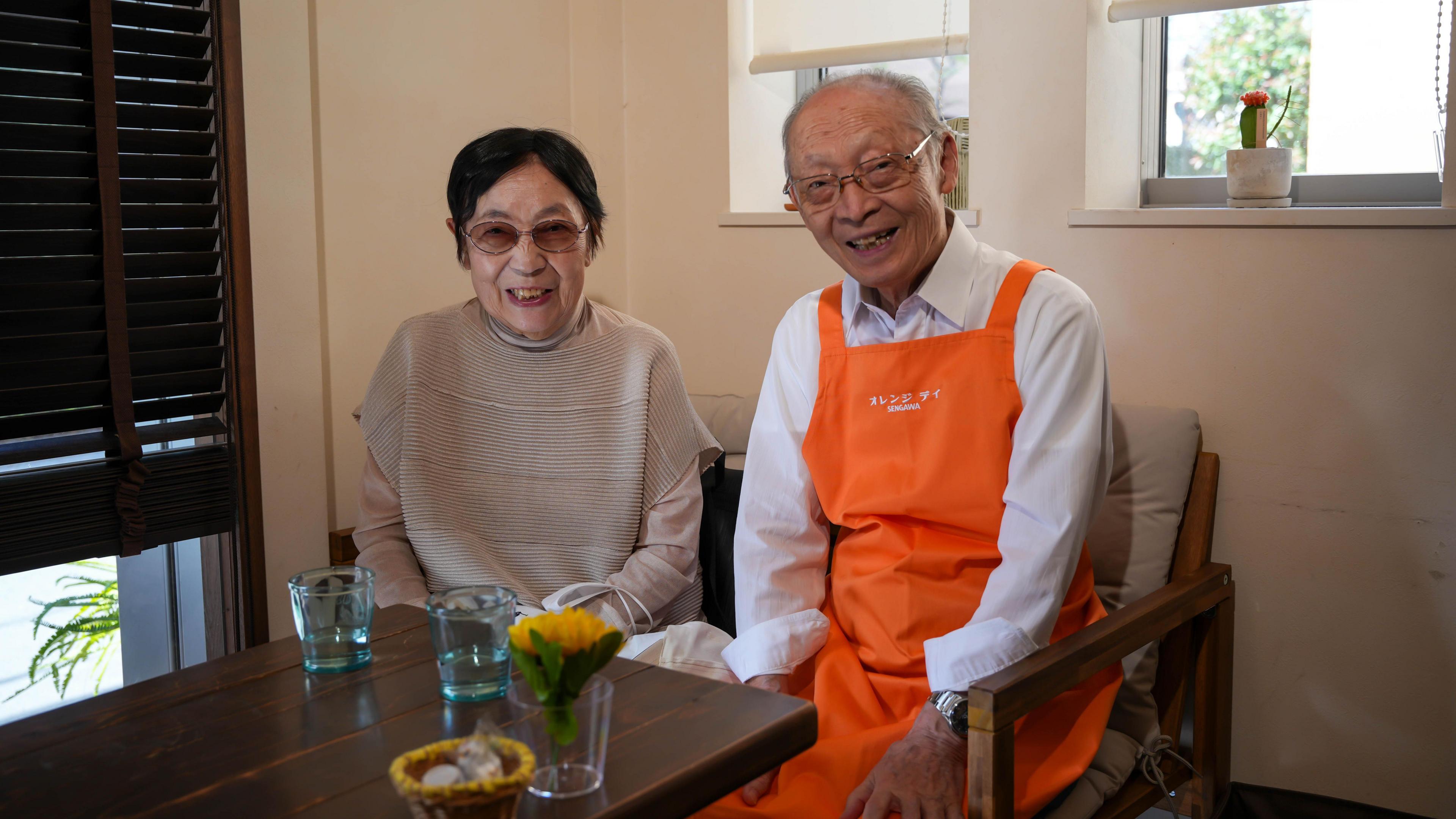 Toshio Morita and his wife sitting at the Restaurant for Mistaken Orders before the start of his shift