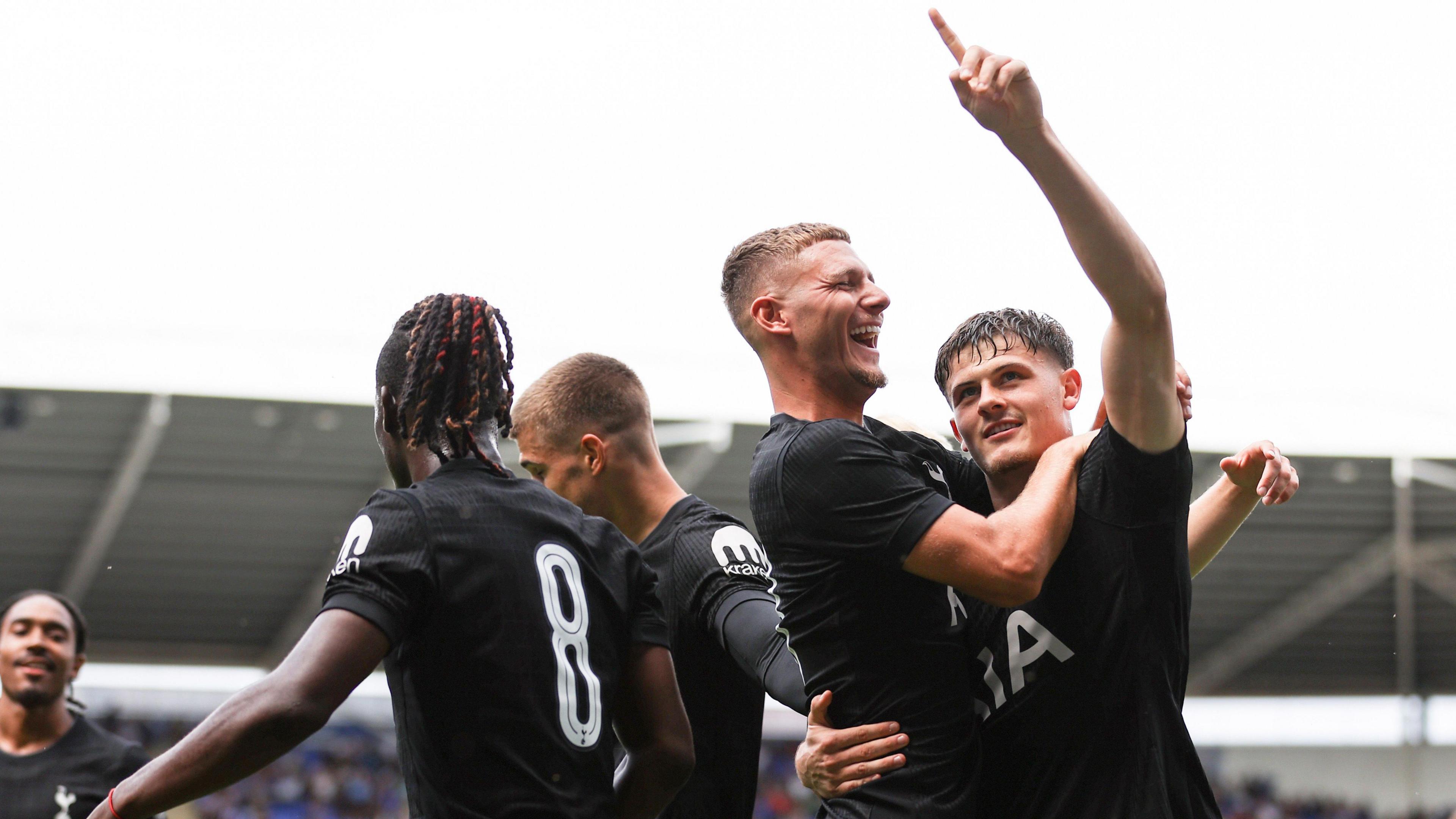 Jamie Donley celebrates with Spurs team-mates