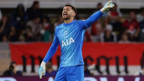 Guglielmo Vicario in action for Tottenham at Monaco