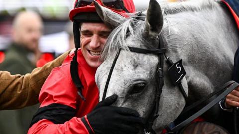 Grey Dawning and jockey Harry Skelton