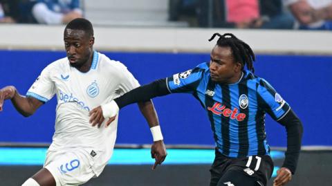 Ademola Lookman challenges for the ball against Club Brugges