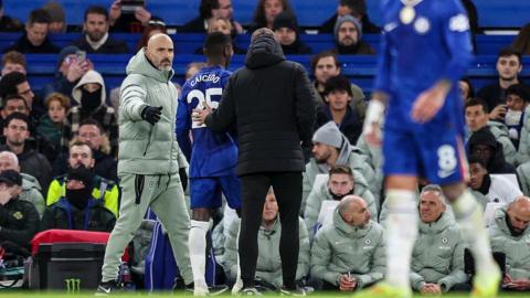 Moises Caicedo of Chelsea is shown a straight red card
