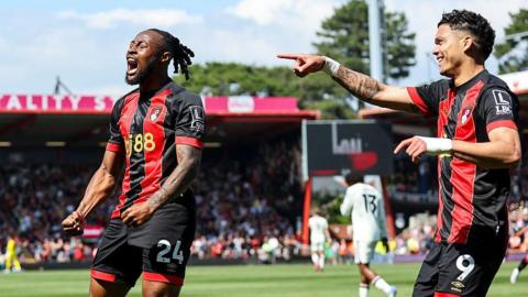 Antoine Semenyo celebrating his goal with Evanilson against Manchester City