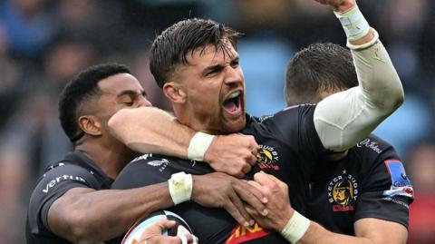 Henry Slade celebrates scoring for Exeter against Harlequins