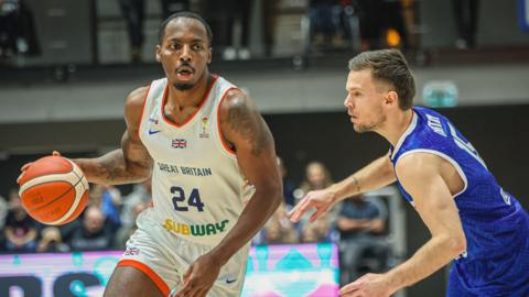 Carl Wheatle drives towards the basket during Great Britain's match with Iceland