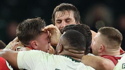 South Africa lock Eben Etzebeth clashs with Wales' Alex Mann