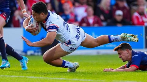 Wakefield Trinity's Mason Lino scores a try against Hull Kingston Rovers