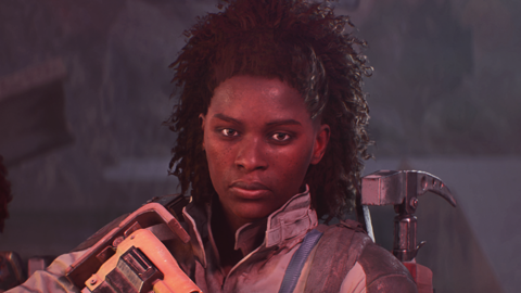 Screenshot from Arc Raiders shows a character holding a large rifle and with a hammer-like tool strapped to her back giving a determined look towards the camera.