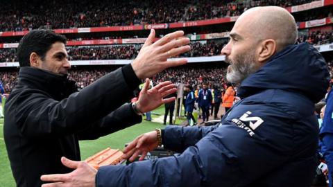 Arteta hugs Maresca at the Emirates Stadium before a match in March 2025