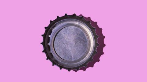 bottle cap on a purple background