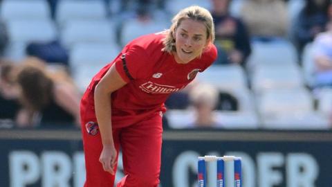 Phoebe Graham bowling for Lancashire