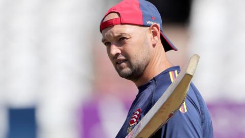 Nick Browne, holding a bat, during practice with Essex