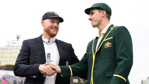 England's Ben Stokes and Australia's Pat Cummins shake hands