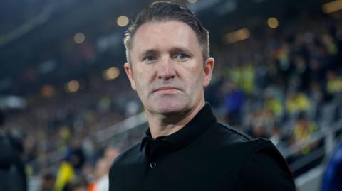 Robbie Keane on the touchline for Ferancvaros
