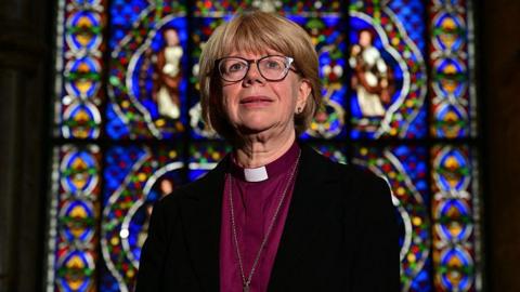 Britain's new Archbishop of Canterbury-designate, Sarah Mullally, poses for a photograph in The Corona Chapel at Canterbury Cathedral, south east England on October 3, 2025