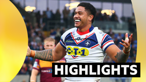 Wakefield celebrate a try against Huddersfield