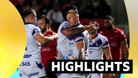 Tom Johnstone of Wakefield celebrates scoring a try for Wakefield
