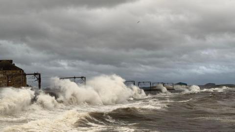 Big waves at the railway line at Saltcoats in North Ayrshire.