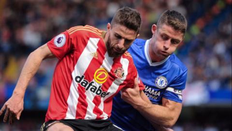 Sunderland and Chelsea players in a tussle for the ball in May 2017