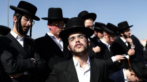 Ultra-Orthodox Jews attend a protest rally against the army recruitment bill in Jerusalem, 30 October 2025.