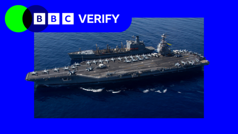 USS Gerald R Ford, the world’s largest American aircraft carrier, with dozens of war planes seen on deck sailing in the ocean alongside a supporting vessel