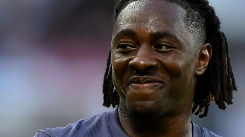 England player smiling