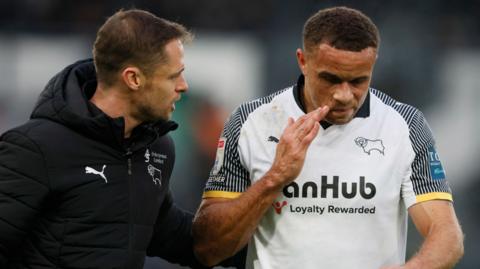 Derby's Carlton Morris looks frustrated as he limps off injured in the 3-2 defeat to Watford