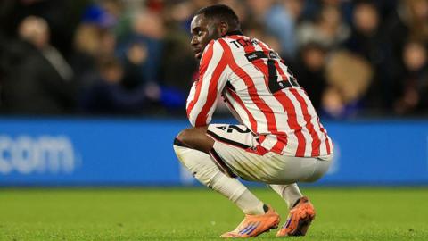 Stoke City's Junior Tchamadeu looking dejected after defeat by Ipswich