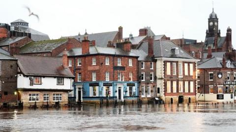 Streets by the River Ouse in York flooded, after heavy rainfall caused the river's water level to rise