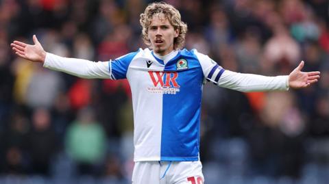 Blackburn captain Todd Cantwell gestures with his arms outstretched