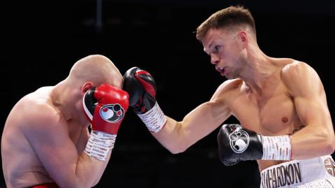 Lewis Richardson lands a right-hand punch to the forehead of Dmitri Protkunas during their fight in Ipswich in June