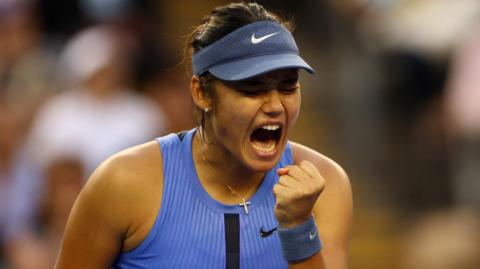 Emma Raducanu celebrates a point during the China Open