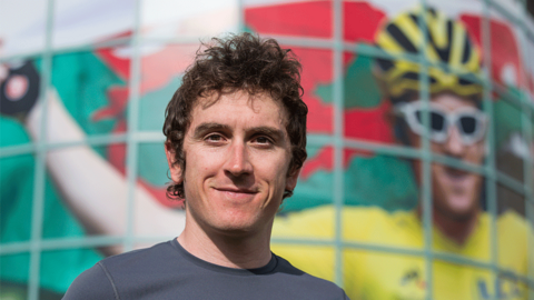 Geraint Thomas outside Newport Velodrome where he trained in his youth. He's beneath a giant poster of himself in his yellow Tour de France winner's jersey