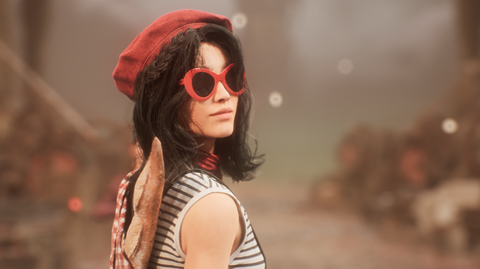 A screenshot from Clair Obscur shows a character with shoulder-length dark hair looking back over her shoulder at the viewer. She wears a red beret, large, red-rimmed sunglasses and a white tank top with thin grey stripes. A knapsack with a baguette poking out of it is slung over her shoulder.