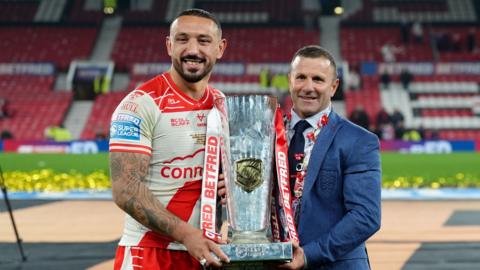 Hull KR captain Elliot Minchella and head coach Willie Peters with the Super League trophy
