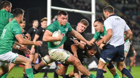 Dan Sheehan carries the ball during Ireland's defeat by the All Blacks at Eden Park in 2022