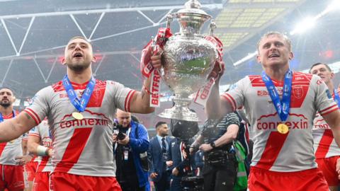Mike Lewis (left) and Jez Litten (right) hold the League Leaders' Shield trophy between them