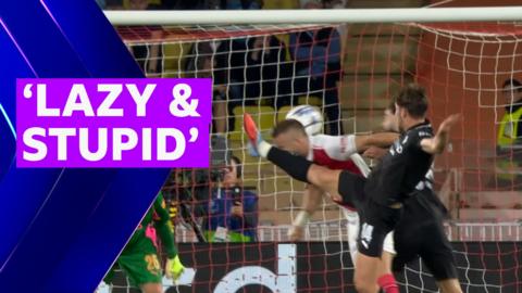 Nico Gonzalez of Manchester City kicks Monaco's Eric Dier in the head