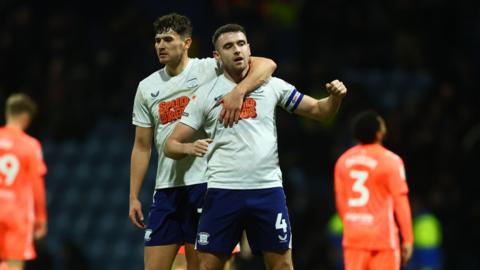 Preston North End's Ben Whiteman celebrating a draw against Coventry with his teammate at Deepdale