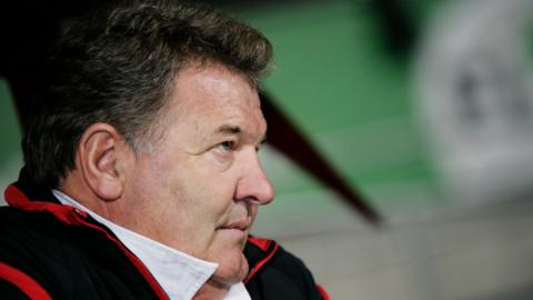 Wales manager John Toshack watches from the dugout