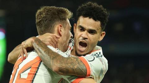 Luis Diaz celebrates with Josip Stanisic