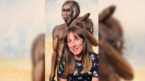 Presenter Rachel Naylor is superimposed on top of an artist's impression of Homo floresiensis or 'Hobbit'