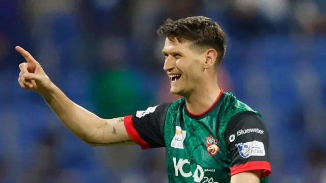 David Payne celebrates a wicket for Desert Vipers